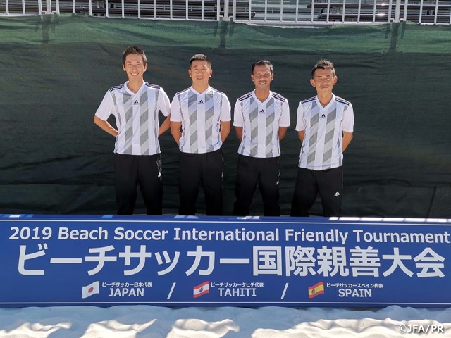 Referees in charge checks match venue ahead of the Beach Soccer International Friendly Tournament